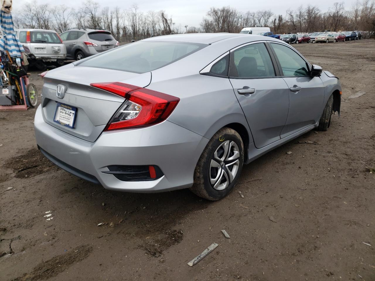 Photo 4 from auction – 2016 HONDA CIVIC LX with VIN 19XFC2F53GE250446