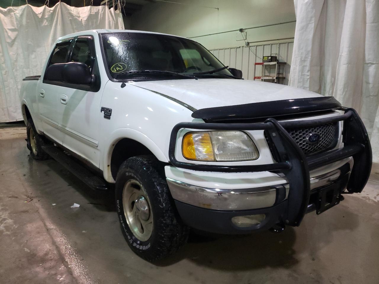 FORD F150 SUPER 2001 with VIN 1FTRW08L31KA24397 - Photo from auction