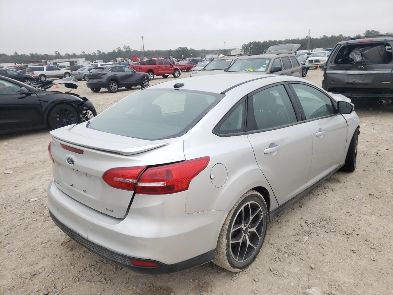 Photo 4 from auction – 2017 FORD FOCUS SEL with VIN 1FADP3H26HL237256