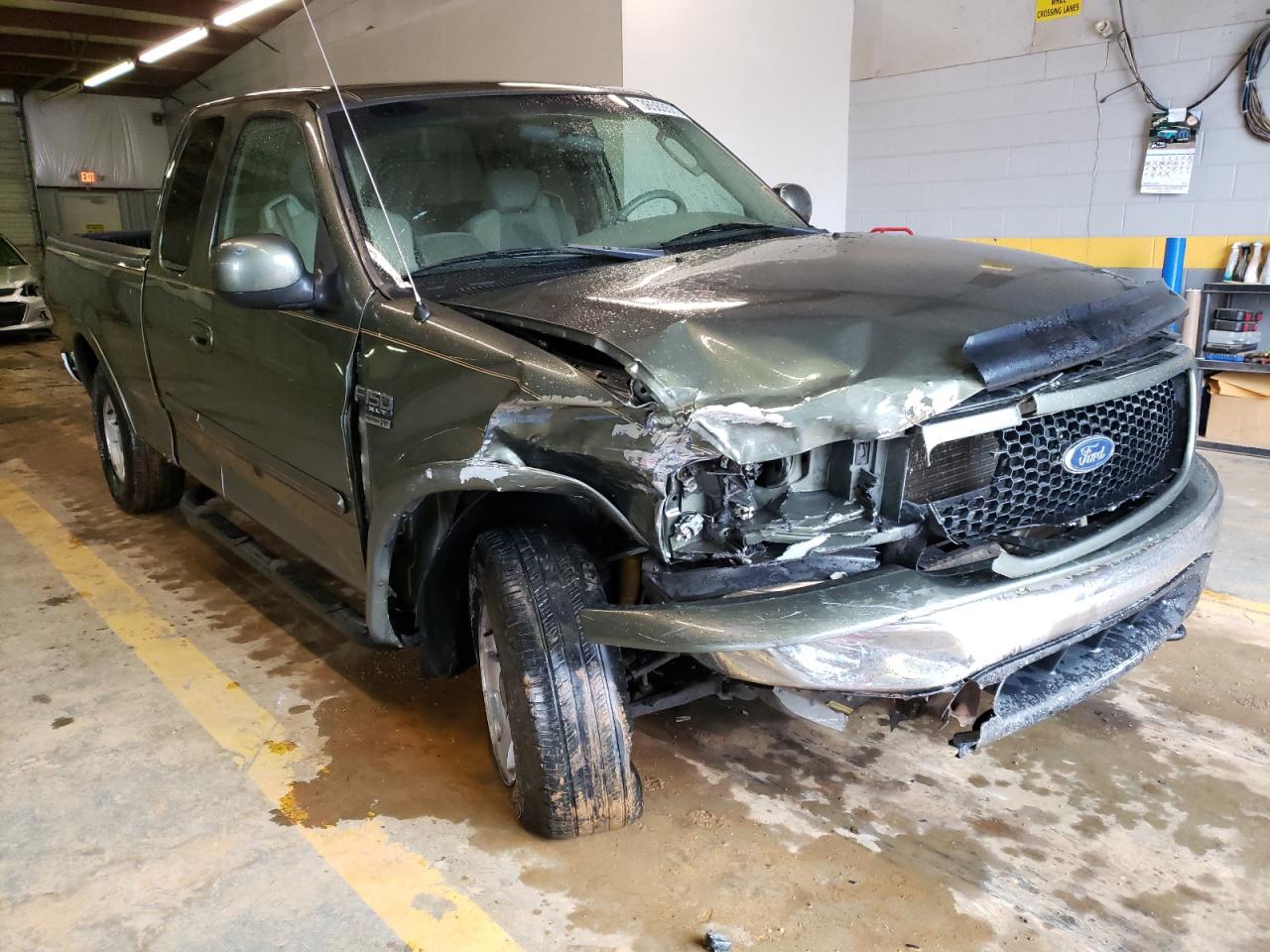 Photo 9 from auction – 2003 FORD F150 with VIN 1FTRX18W13NA65738