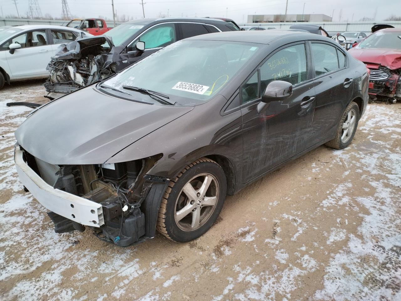 Photo 2 from auction – 2013 HONDA CIVIC LX with VIN 2HGFB2F54DH564014