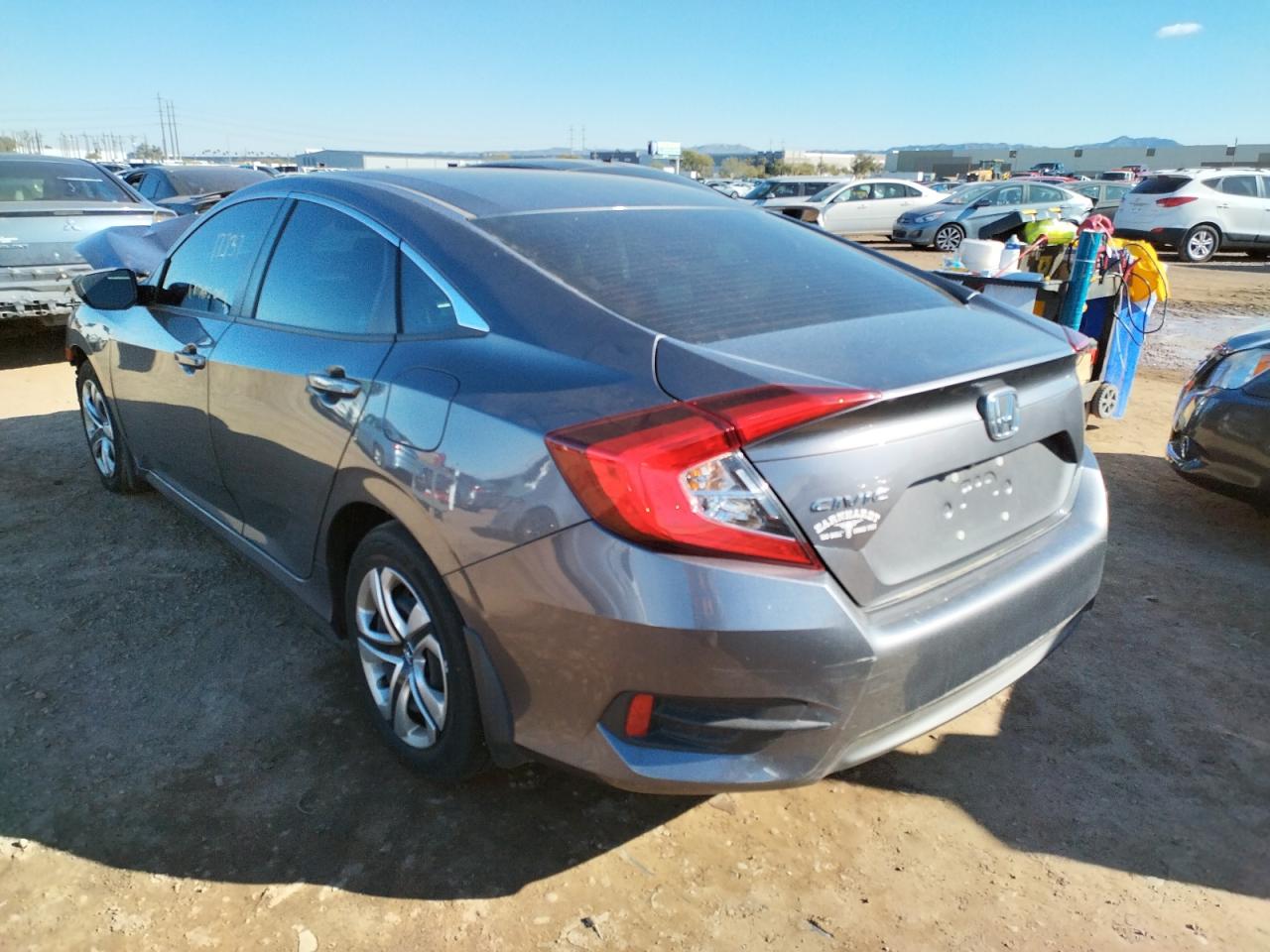 Photo 3 from auction – 2016 HONDA CIVIC LX with VIN 19XFC2F50GE037972