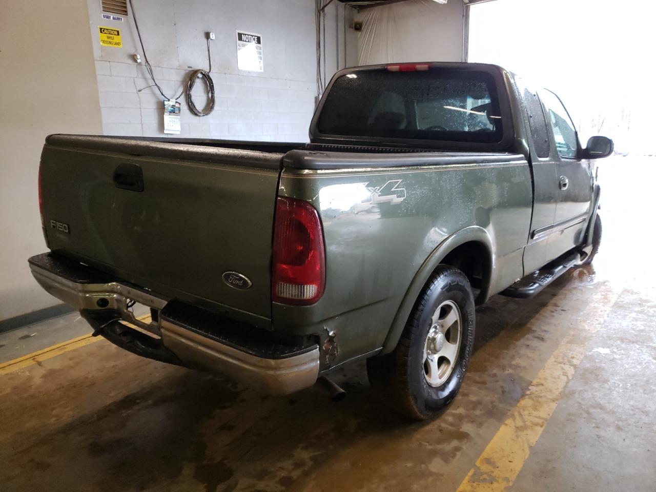 Photo 4 from auction – 2003 FORD F150 with VIN 1FTRX18W13NA65738