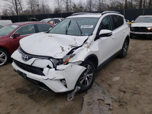 Photo 2 from auction – 2016 TOYOTA RAV4 XLE with VIN 2T3RFREV7GW528512