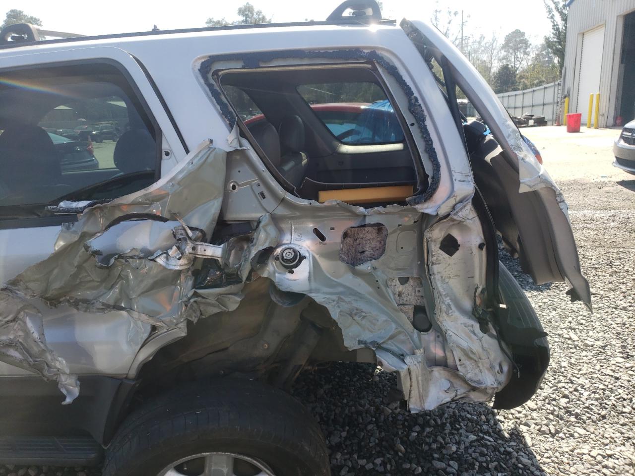Photo 9 from auction – 2002 FORD ESCAPE with VIN 1FMYU01B12KB76808