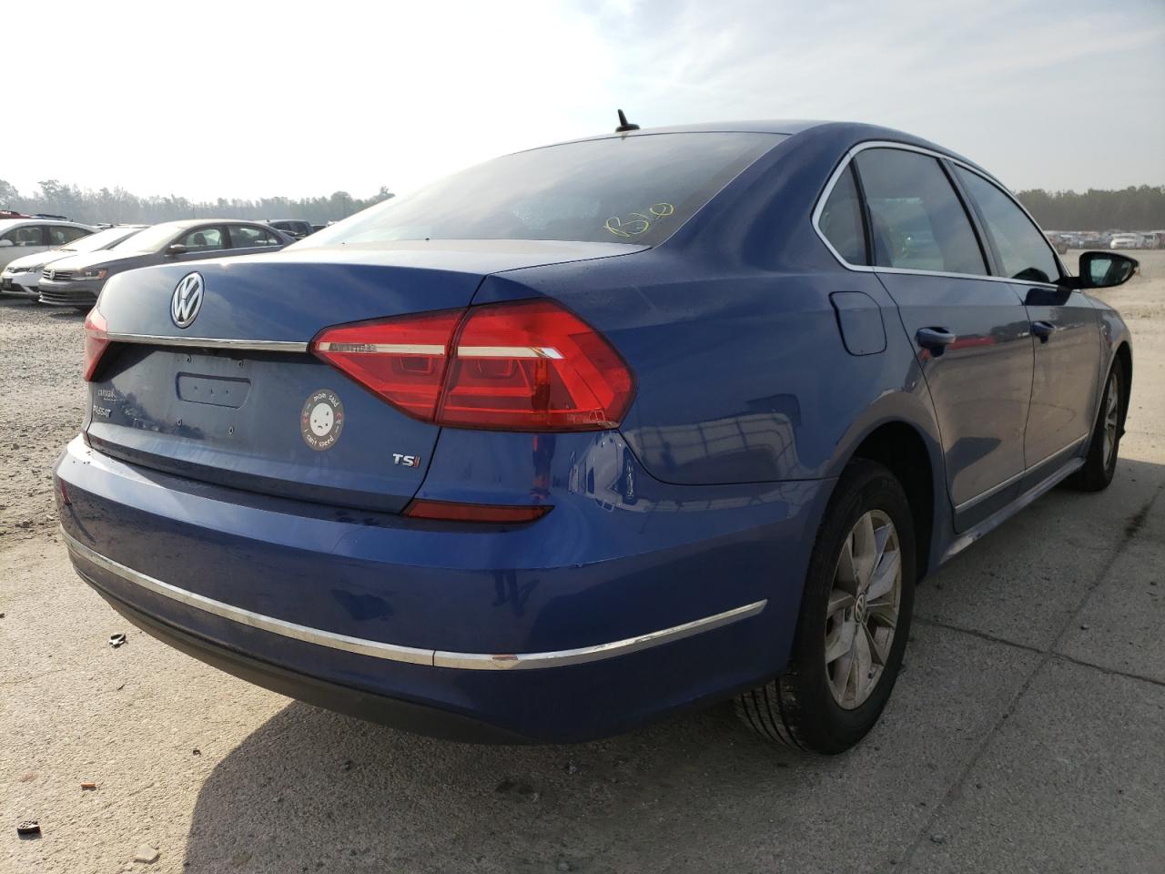 Photo 4 from auction – 2016 VOLKSWAGEN PASSAT S with VIN 1VWAT7A39GC020749