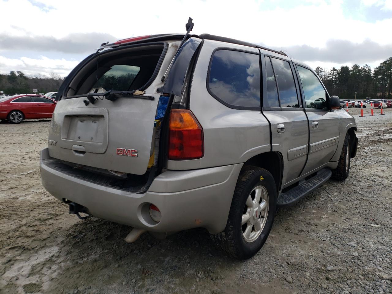 Photo 4 from auction – 2004 GMC ENVOY with VIN 1GKDS13S042327561