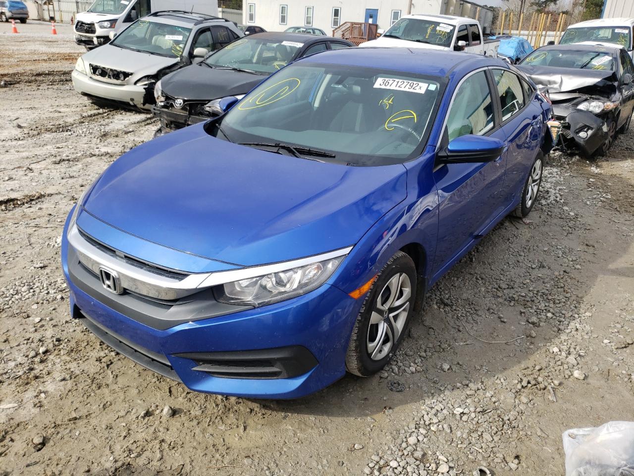 Photo 2 from auction – 2016 HONDA CIVIC LX with VIN 19XFC2F58GE023818