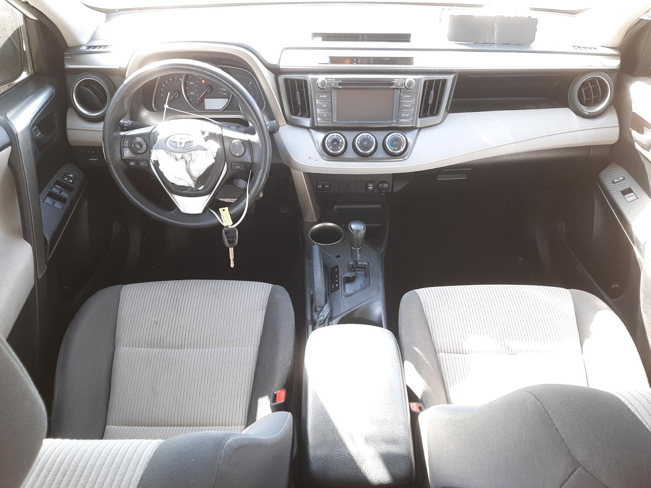 Photo 9 from auction – 2014 TOYOTA RAV4 LE with VIN JTMZFREV8EJ021677