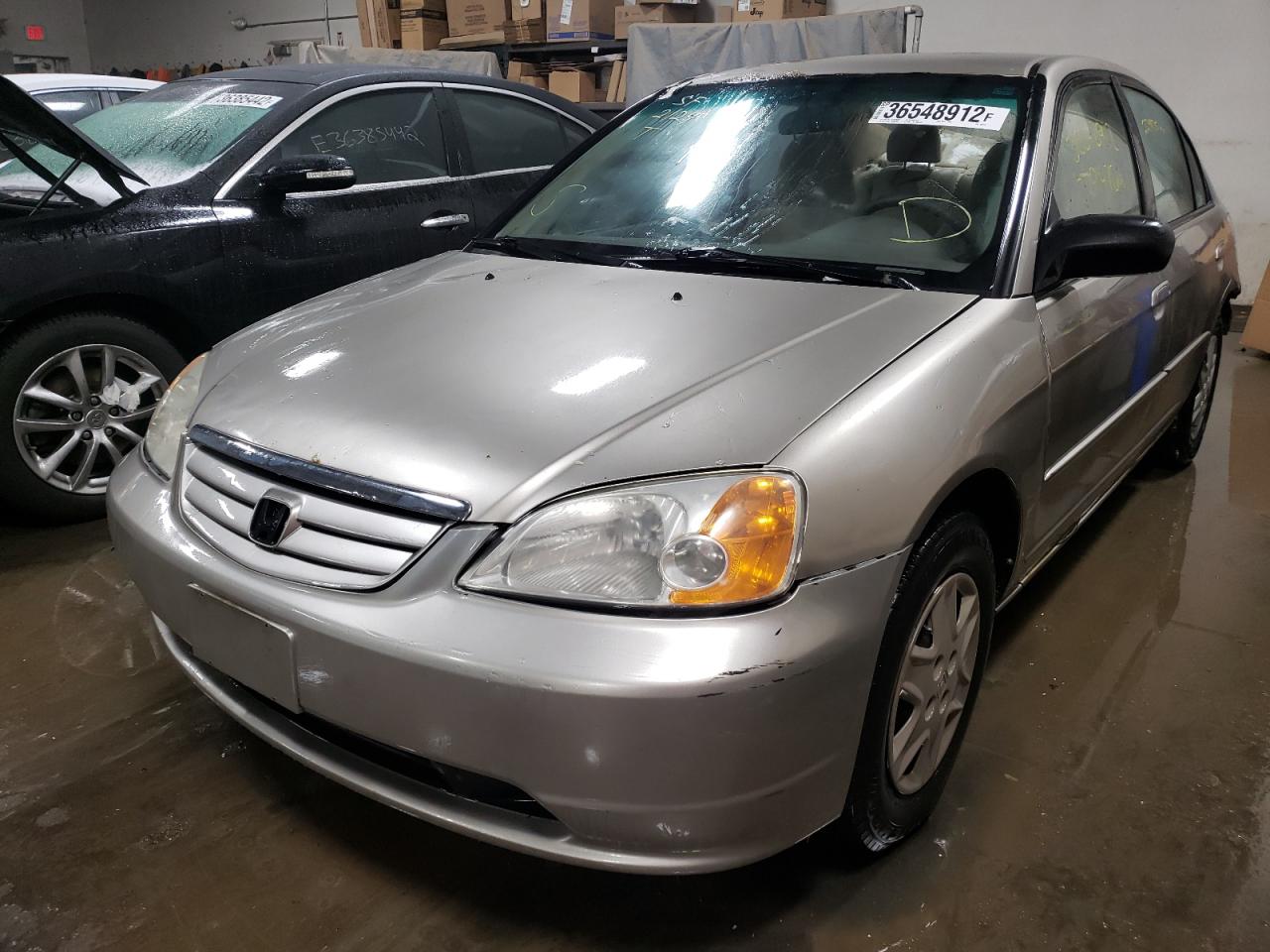 Photo 2 from auction – 2003 HONDA CIVIC LX with VIN JHMES16563S003775