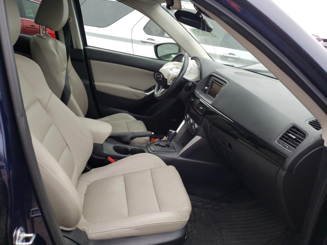 Photo 5 from auction – 2014 MAZDA CX-5 GT with VIN JM3KE2DY7E0314958