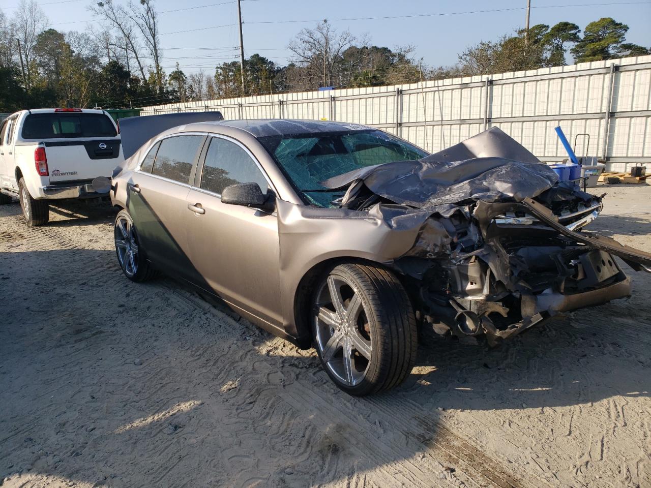 CHEVROLET MALIBU LS 2010 with VIN 1G1ZB5EB0AF182914 - Photo from auction