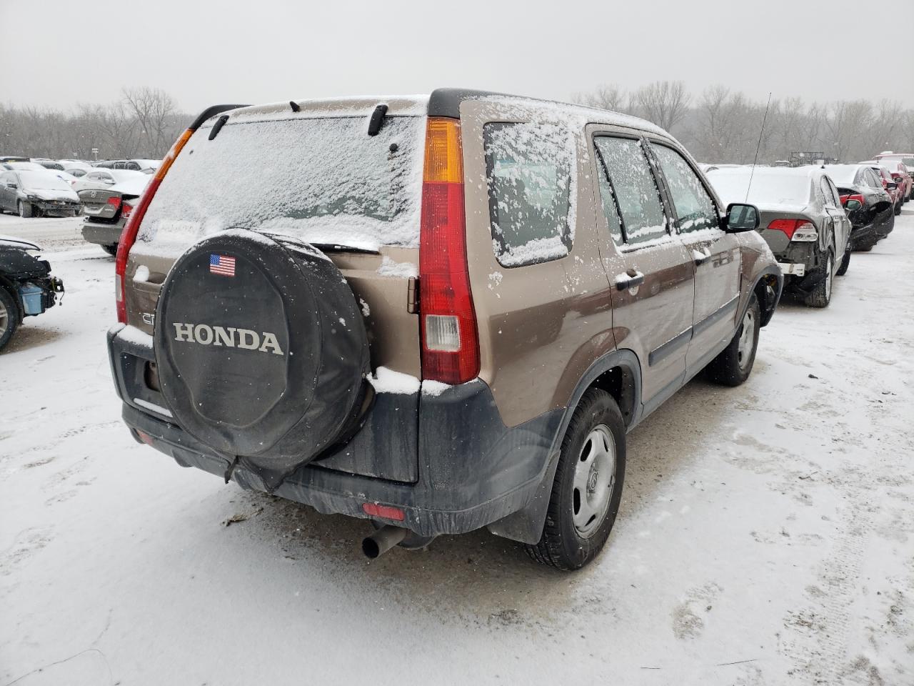Photo 4 from auction – 2003 HONDA CR-V LX with VIN JHLRD78503C014037