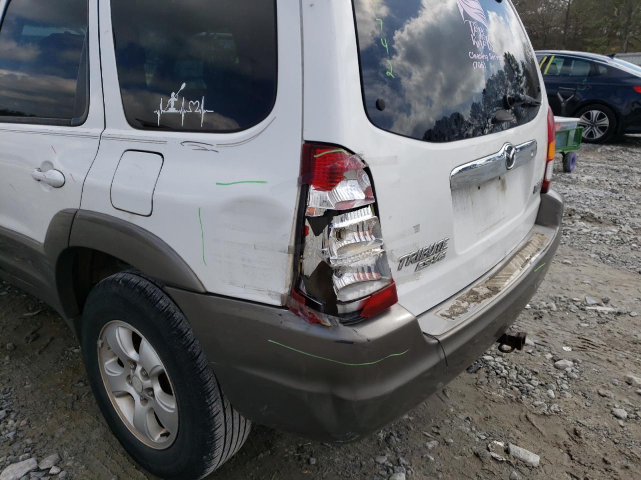 Photo 9 from auction – 2001 MAZDA TRIBUTE LX with VIN 4F2YU09101KM38963