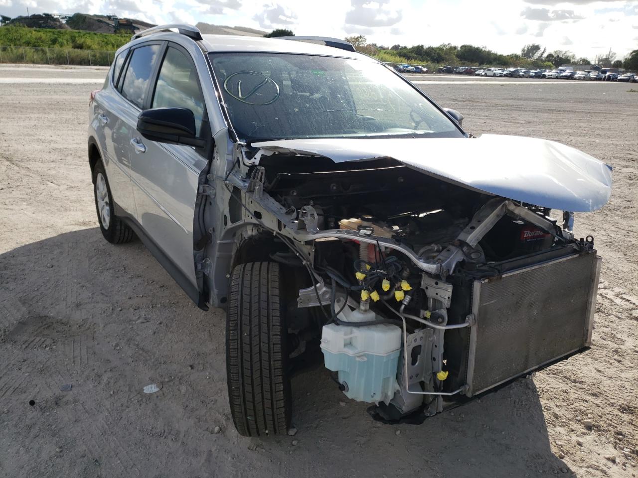 TOYOTA RAV4 LE 2013 with VIN JTMZFREV8DD013060 - Photo from auction