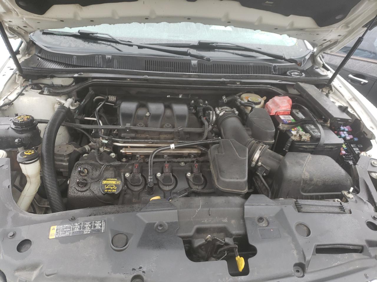 Photo 7 from auction – 2013 FORD TAURUS SE with VIN 1FAHP2D82DG152634