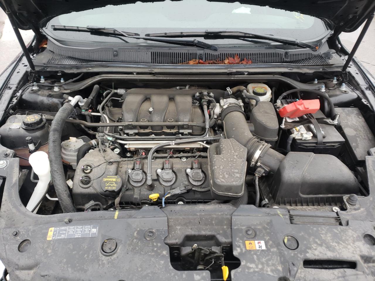 Photo 7 from auction – 2014 FORD TAURUS SEL with VIN 1FAHP2H89EG117309