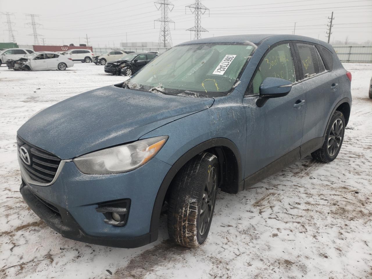 Photo 2 from auction – 2016 MAZDA CX-5 GT with VIN JM3KE4DYXG0848809