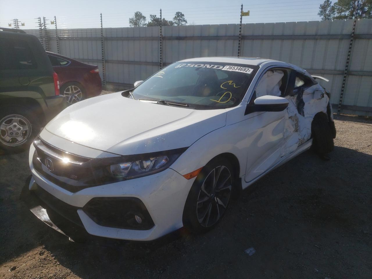 Photo 2 from auction – 2019 HONDA CIVIC SI with VIN 2HGFC3A53KH754703