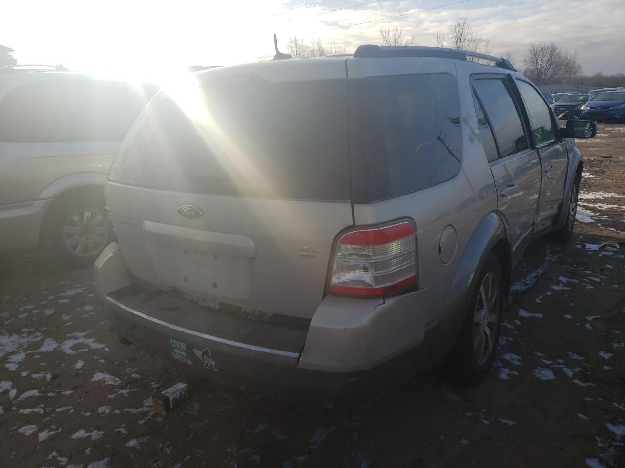 Photo 4 from auction – 2009 FORD TAURUS X S with VIN 1FMDK05W99GA04864