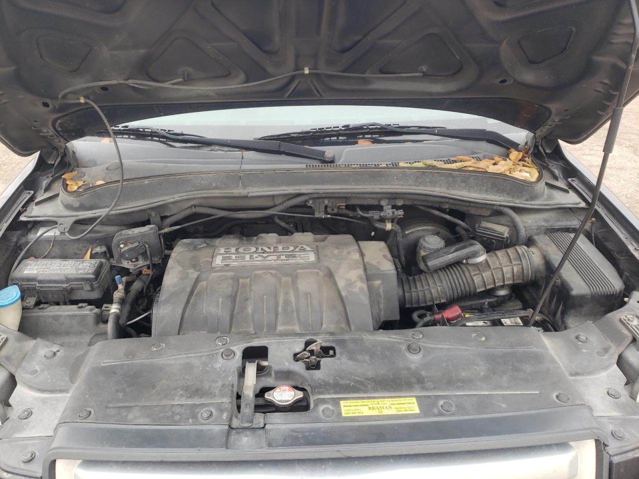 Photo 7 from auction – 2006 HONDA PILOT LX with VIN 5FNYF28186B049144
