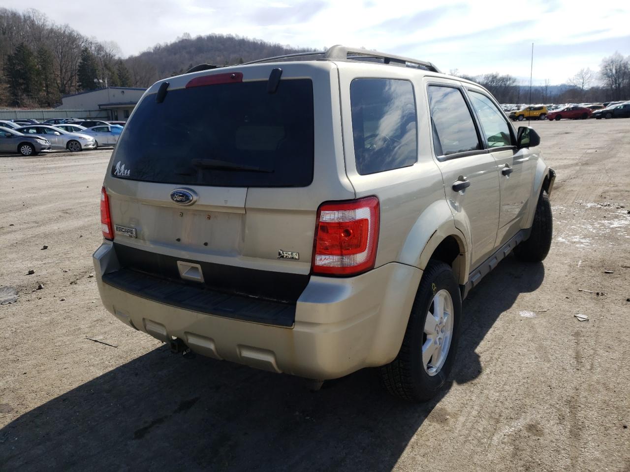 Photo 4 from auction – 2011 FORD ESCAPE XLT with VIN 1FMCU0DG2BKB02055