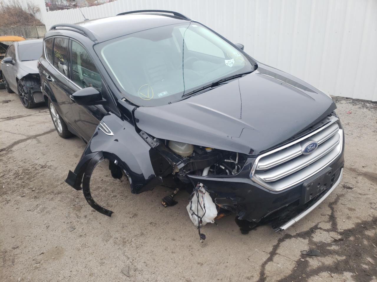 FORD ESCAPE SE 2017 with VIN 1FMCU9GDXHUD99398 - Photo from auction