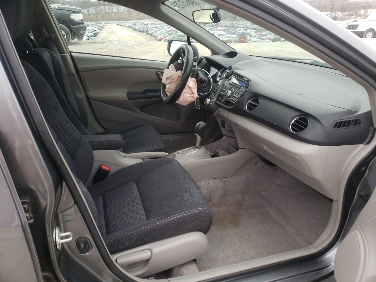 Photo 5 from auction – 2011 HONDA INSIGHT LX with VIN JHMZE2H57BS012866