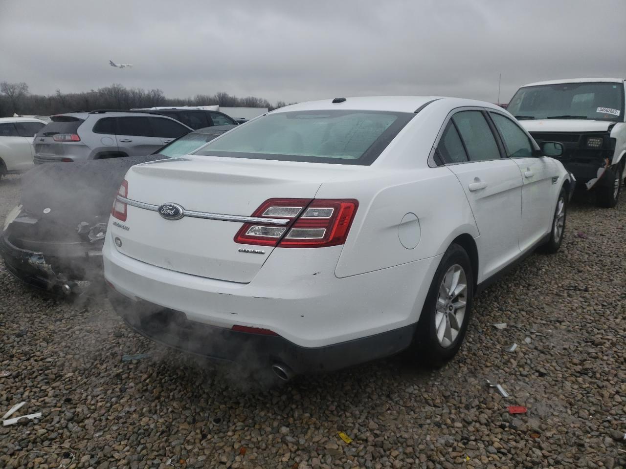 Photo 4 from auction – 2013 FORD TAURUS SE with VIN 1FAHP2D82DG152634