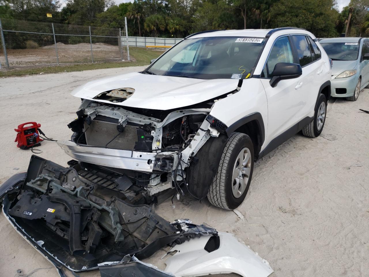 Photo 2 from auction – 2020 TOYOTA RAV4 LE with VIN 2T3H1RFVXLW080317