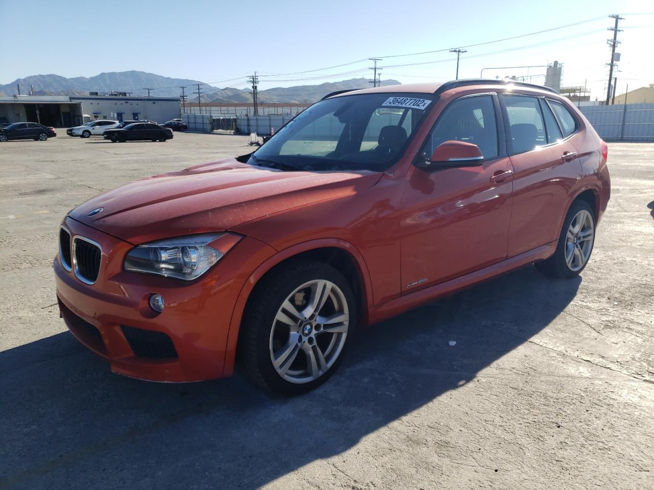 Photo 2 from auction – 2013 BMW X1 XDRIVE2 with VIN WBAVL1C58DVR86605