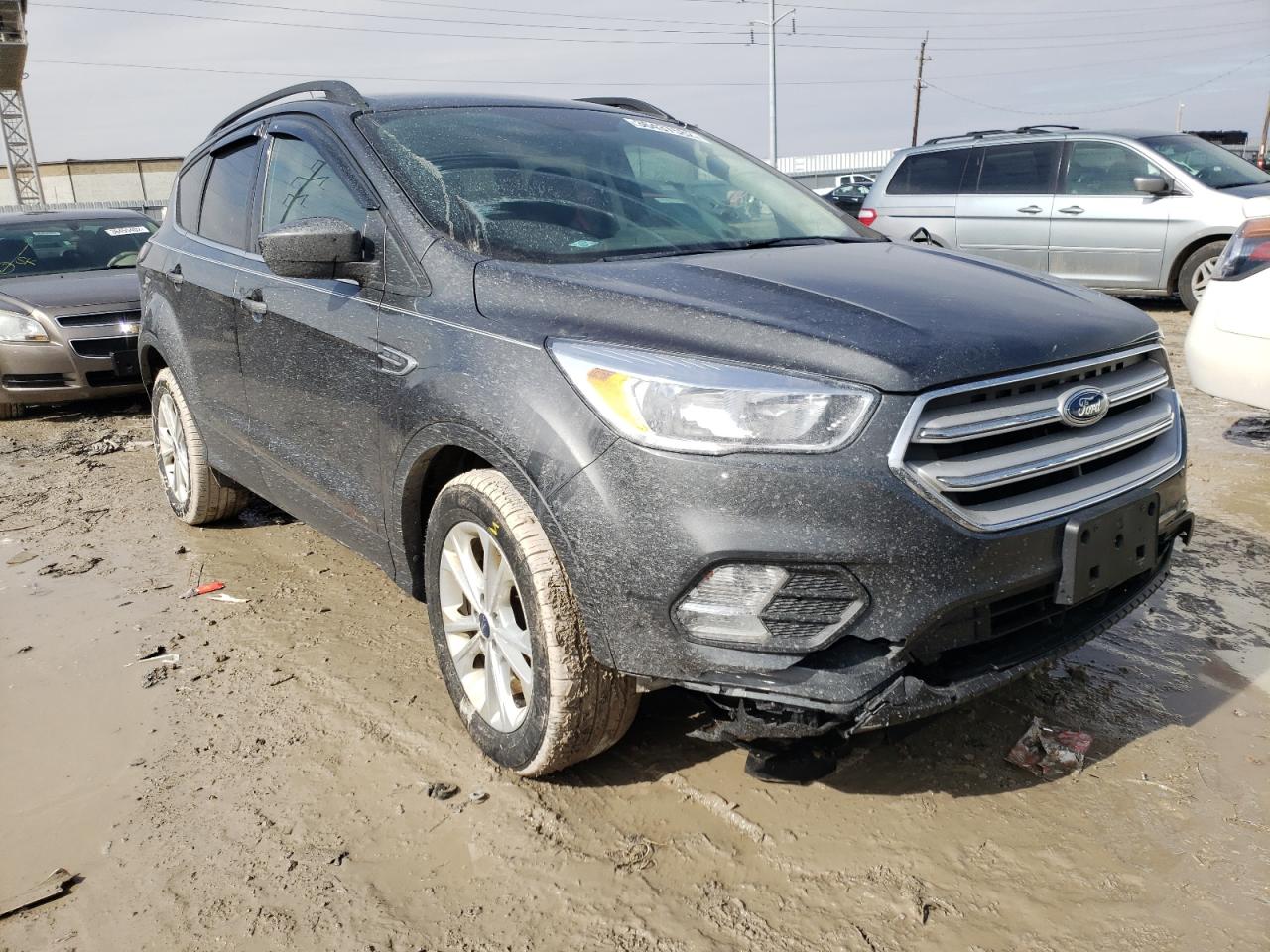 FORD ESCAPE SE 2018 with VIN 1FMCU0GD6JUC18427 - Photo from auction