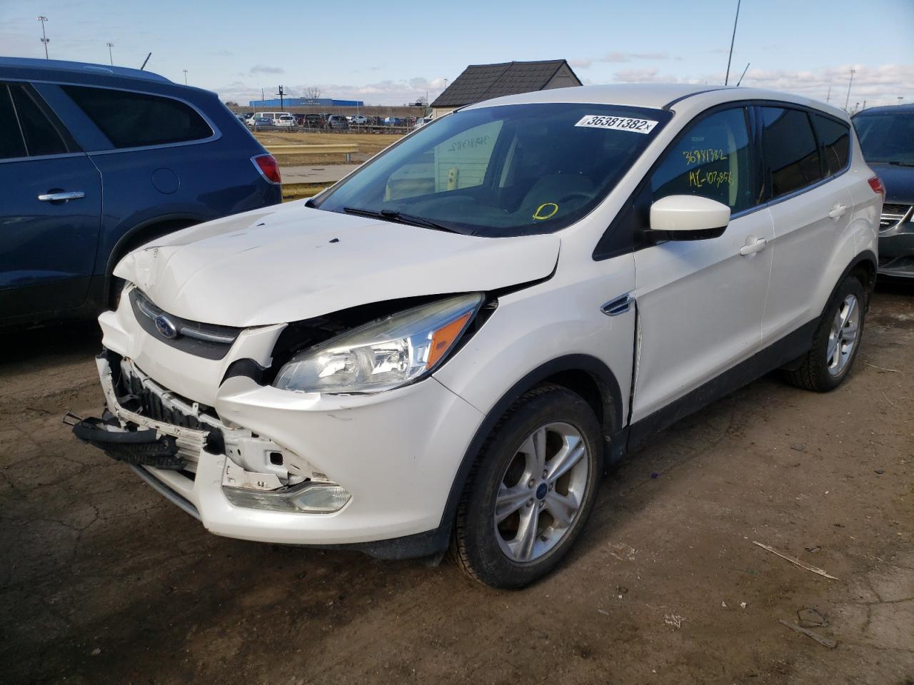 Photo 2 from auction – 2014 FORD ESCAPE SE with VIN 1FMCU9GX6EUE31592