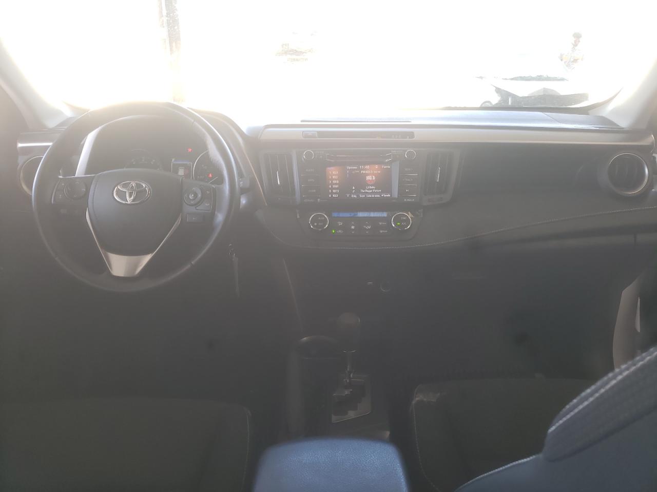 Photo 9 from auction – 2017 TOYOTA RAV4 XLE with VIN JTMWFREV4HD101662