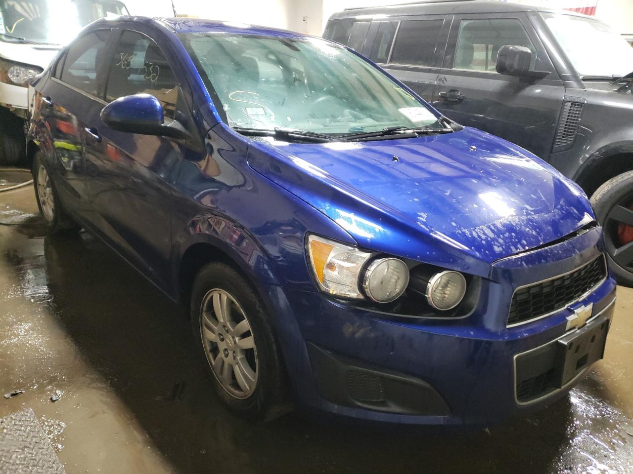 CHEVROLET SONIC LT 2014 with VIN 1G1JC5SH4E4182399 - Photo from auction
