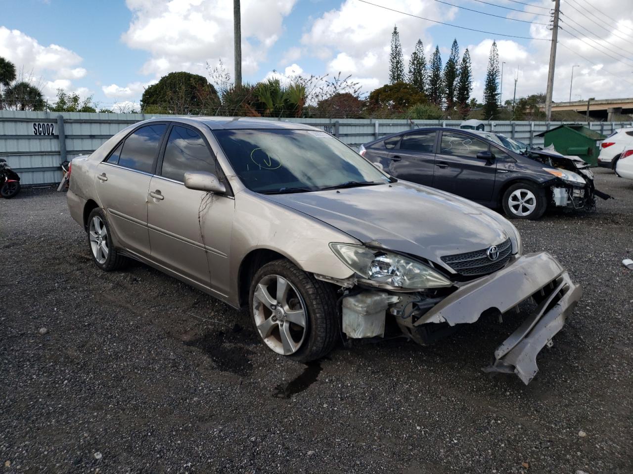 TOYOTA CAMRY LE 2003 with VIN 4T1BF30K73U548239 - Photo from auction