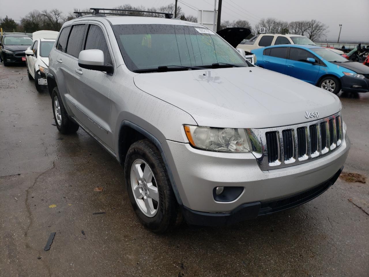 JEEP GRAND CHER 2011 with VIN 1J4RS4GG3BC658239 - Photo from auction