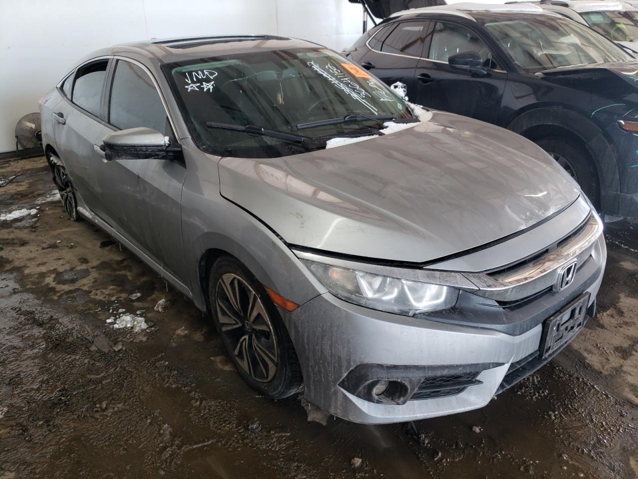 HONDA CIVIC EXL 2016 with VIN 2HGFC1F7XGH653308 - Photo from auction