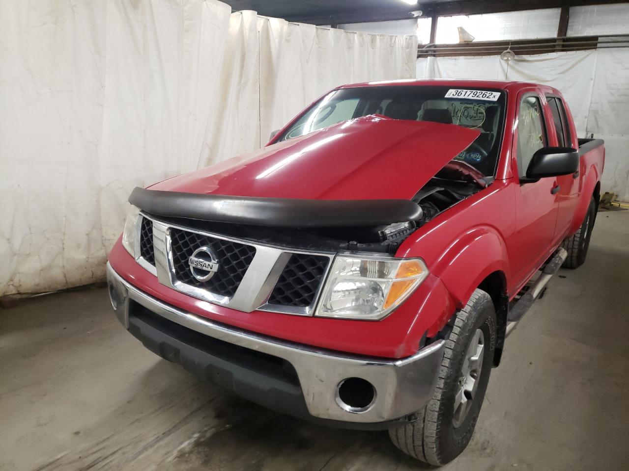 Photo 9 from auction – 2007 NISSAN FRONTIER C with VIN 1N6AD09W47C409186