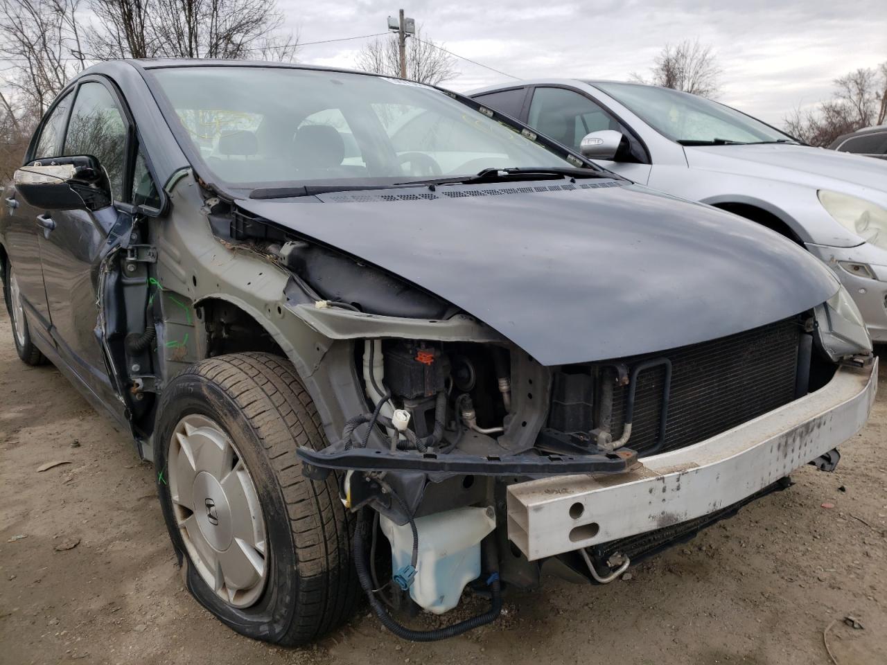 Photo 9 from auction – 2007 HONDA CIVIC HYBR with VIN JHMFA36257S019836