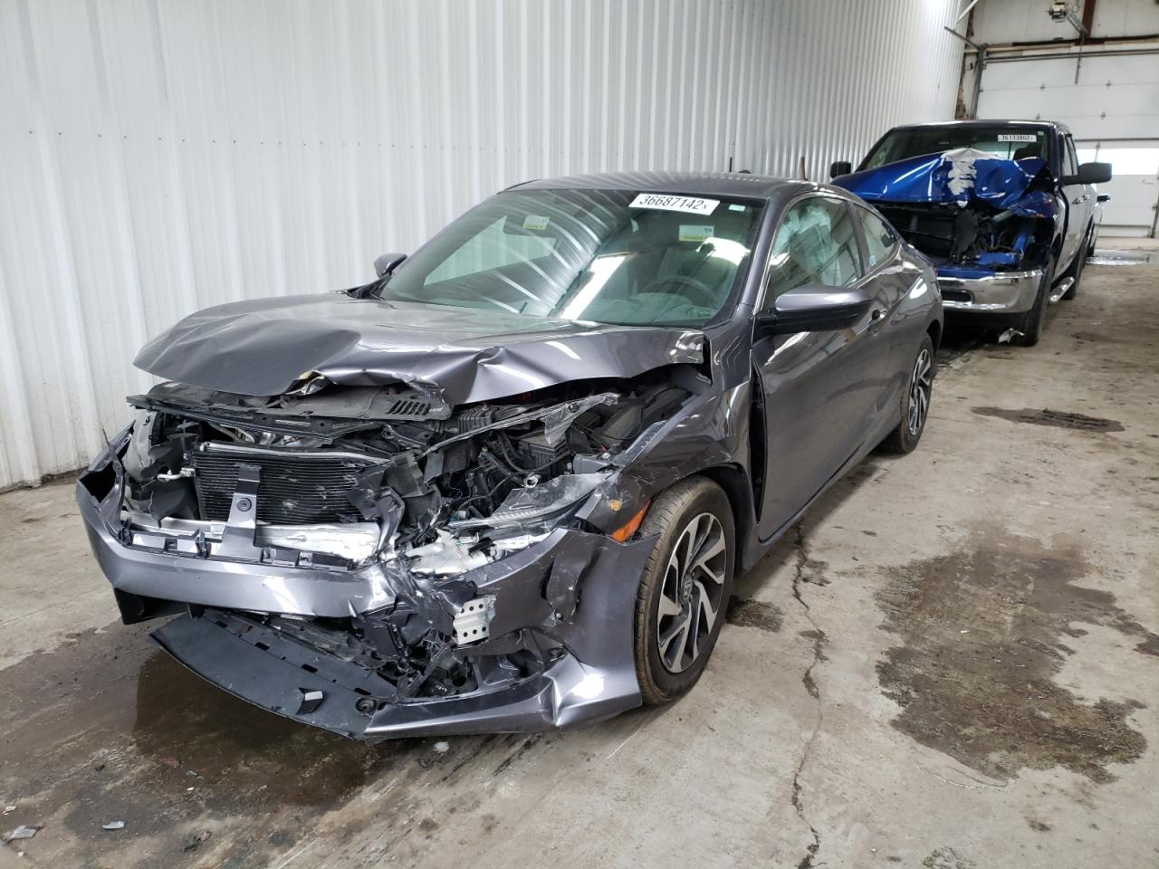 Photo 2 from auction – 2016 HONDA CIVIC LX with VIN 2HGFC4B59GH303593