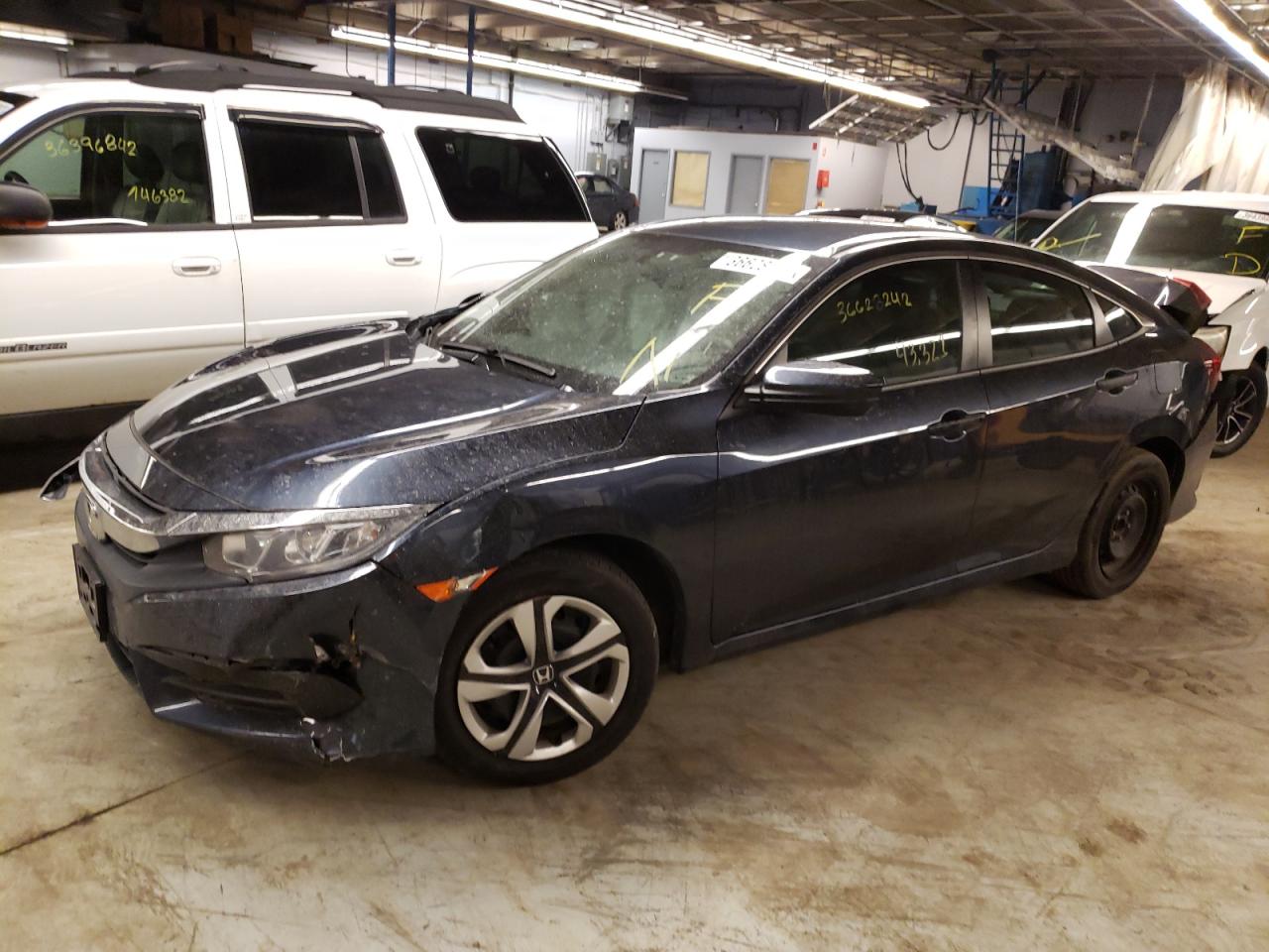 Photo 2 from auction – 2018 HONDA CIVIC LX with VIN 19XFC2F56JE024716