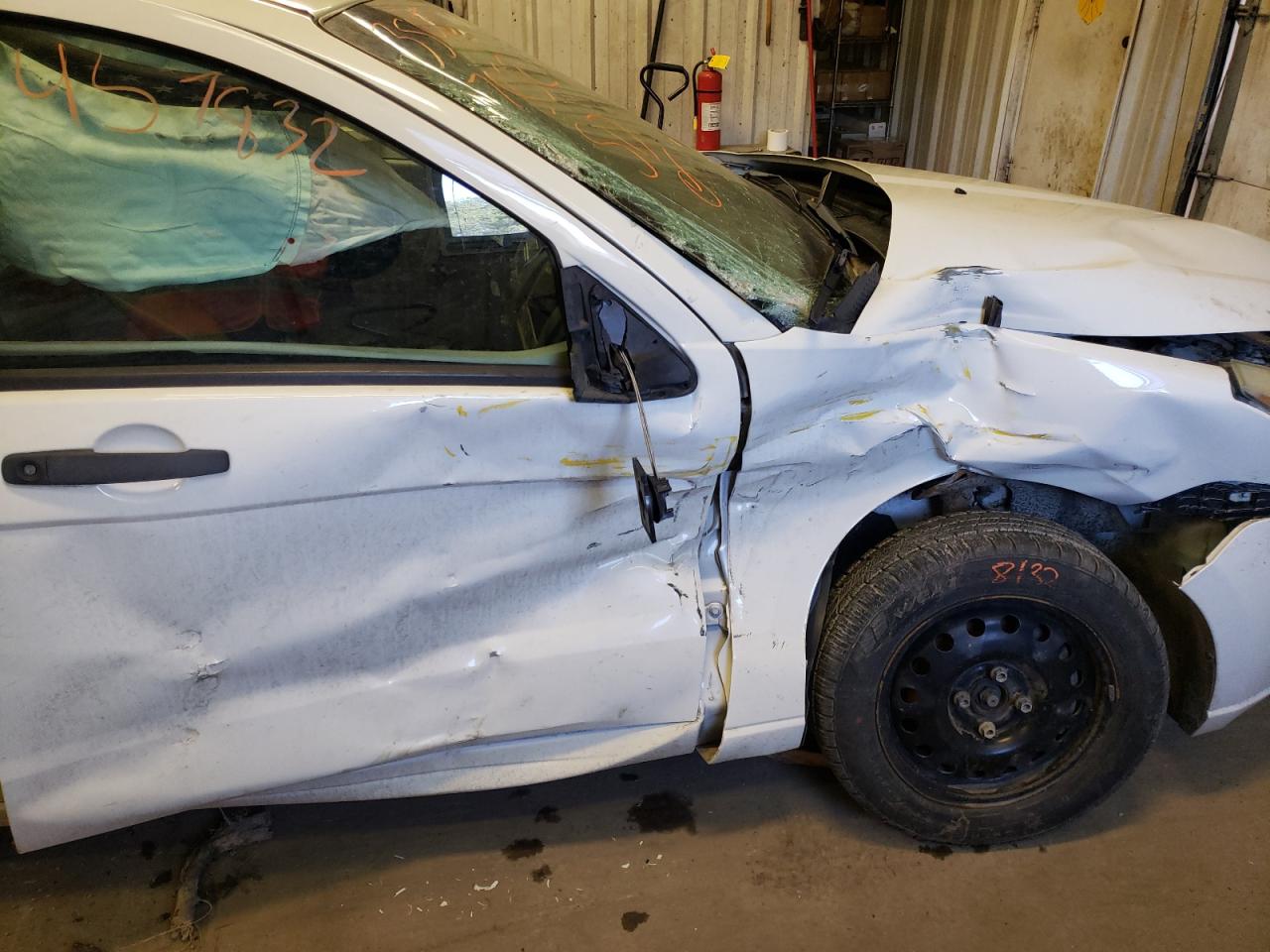Photo 9 from auction – 2009 FORD FOCUS S with VIN 1FAHP34N89W233887
