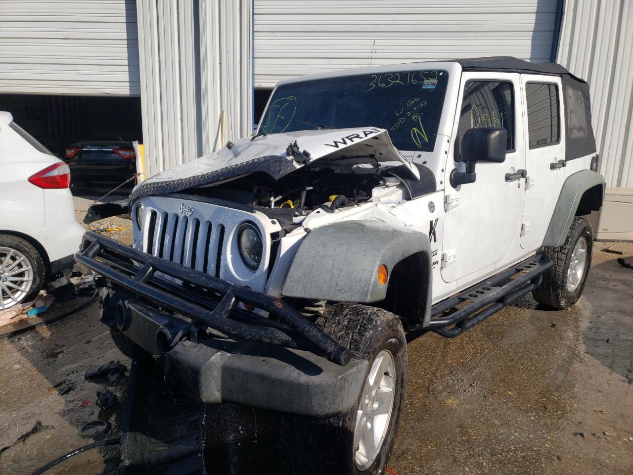 Photo 2 from auction – 2011 JEEP WRANGLER U with VIN 1J4BA3H12BL605248