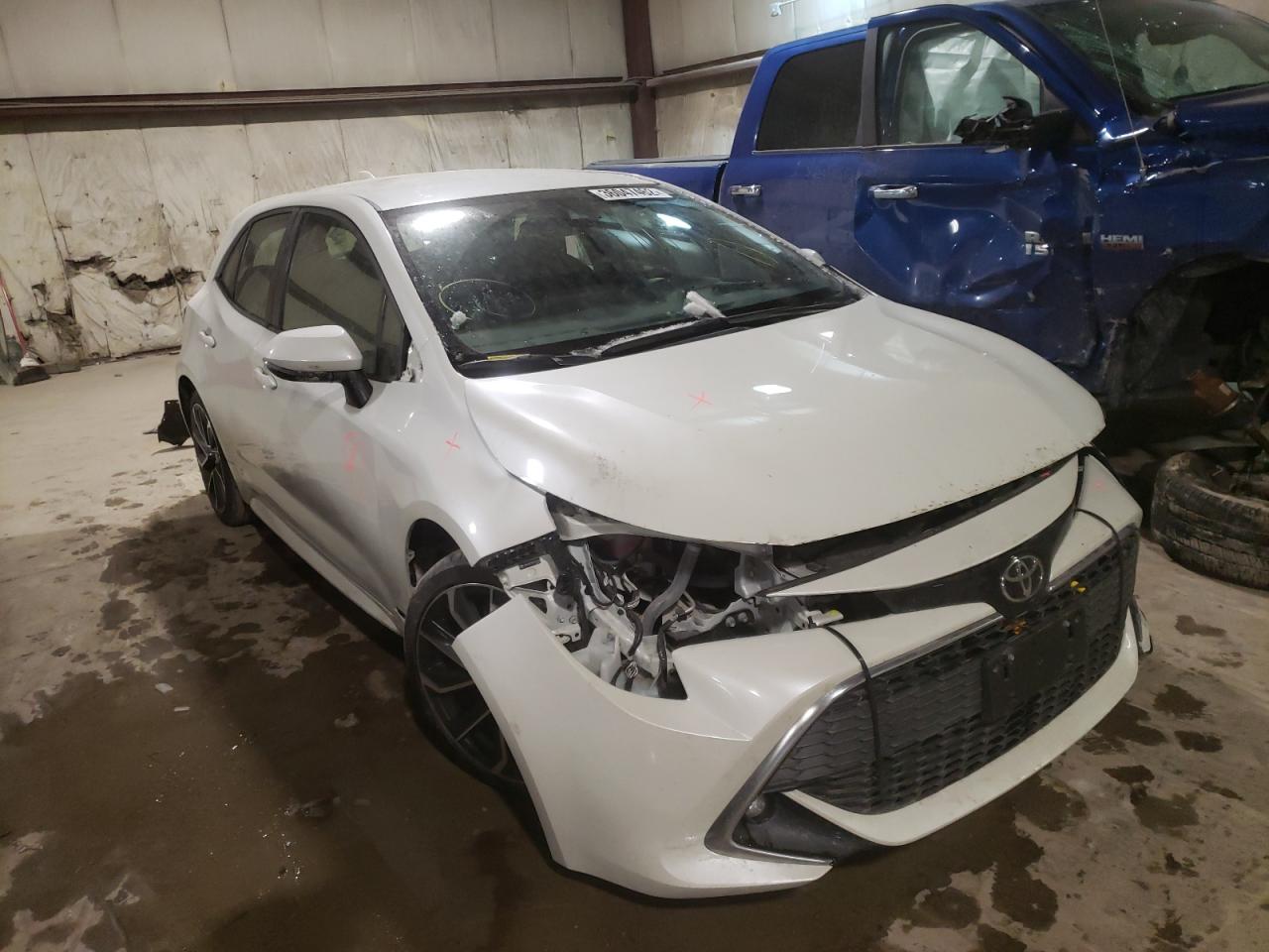 TOYOTA COROLLA SE 2019 with VIN JTNK4RBE5K3014466 - Photo from auction