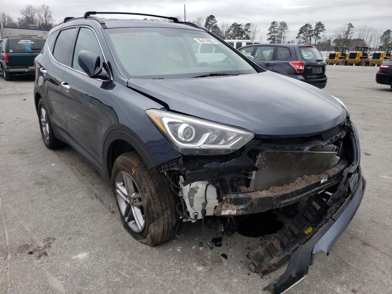 HYUNDAI SANTA FE S 2017 with VIN 5NMZU3LB1HH017654 - Photo from auction