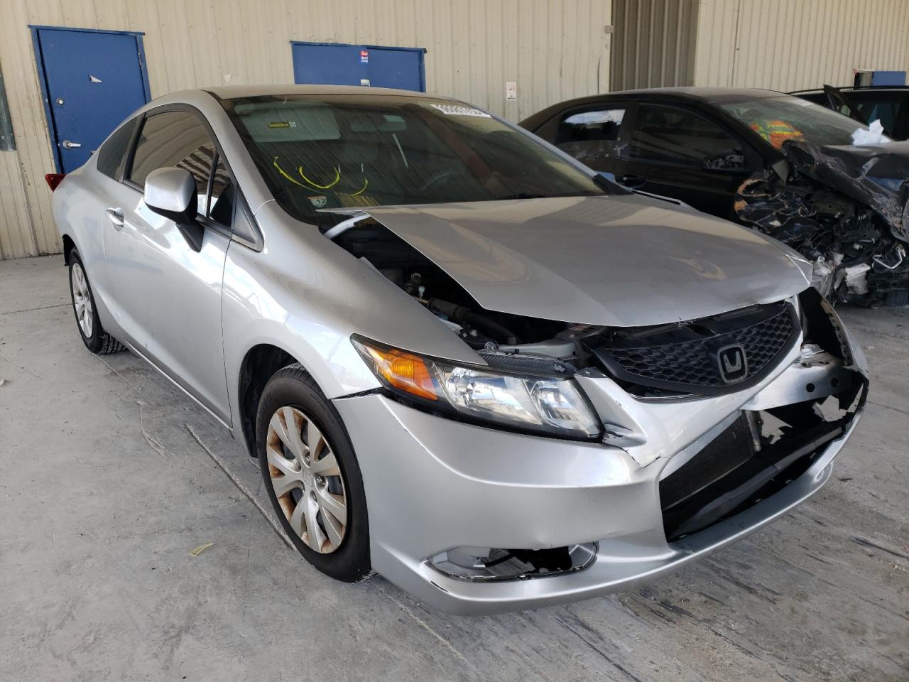 HONDA CIVIC LX 2012 with VIN 2HGFG3B5XCH557676 - Photo from auction