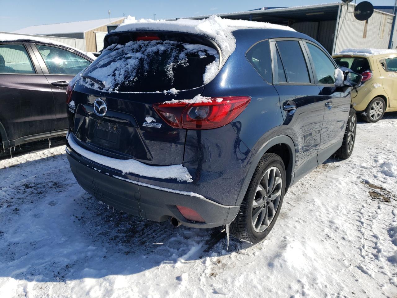 Photo 4 from auction – 2016 MAZDA CX-5 GT with VIN JM3KE2DYXG0728268