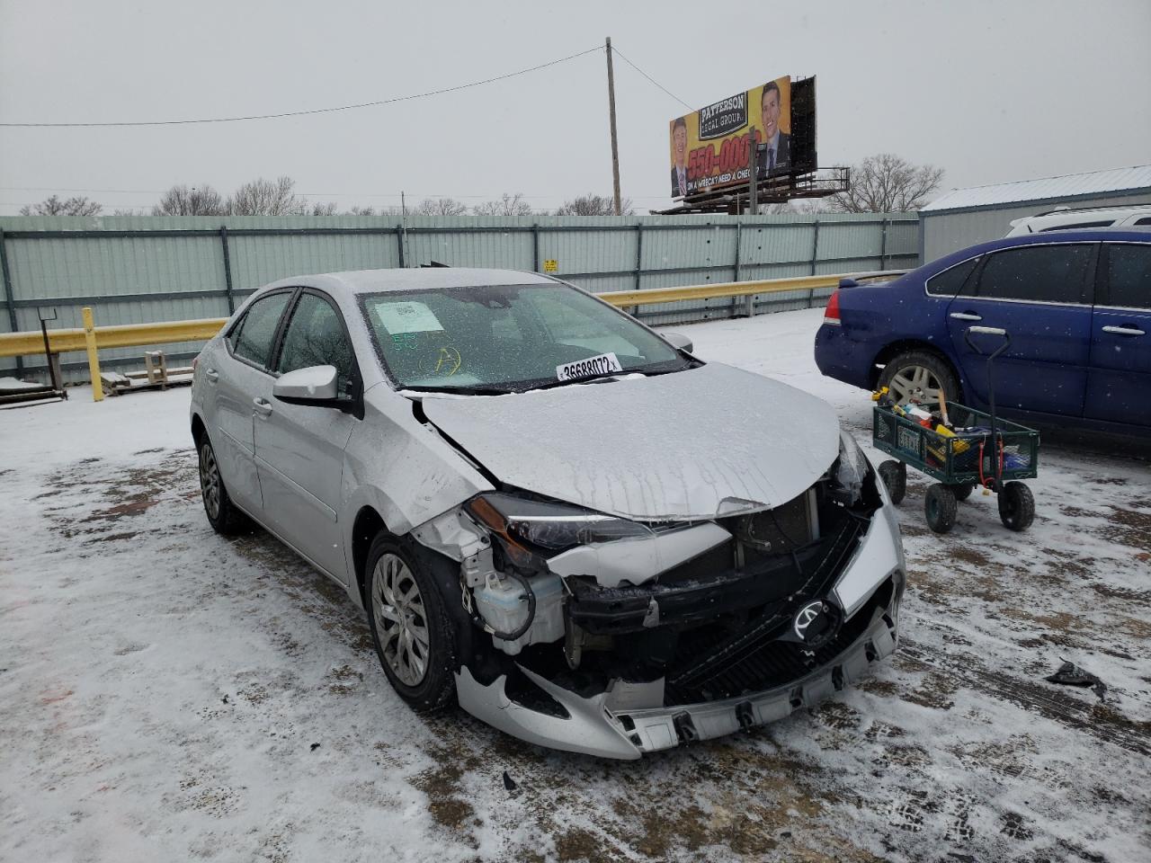 TOYOTA COROLLA L 2017 with VIN 5YFBURHE4HP736992 - Photo from auction