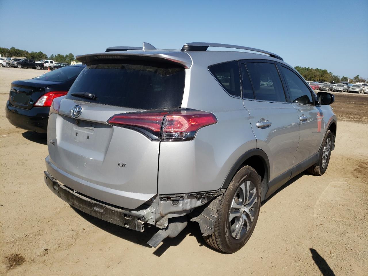 Photo 4 from auction – 2018 TOYOTA RAV4 LE with VIN 2T3ZFREV2JW504089